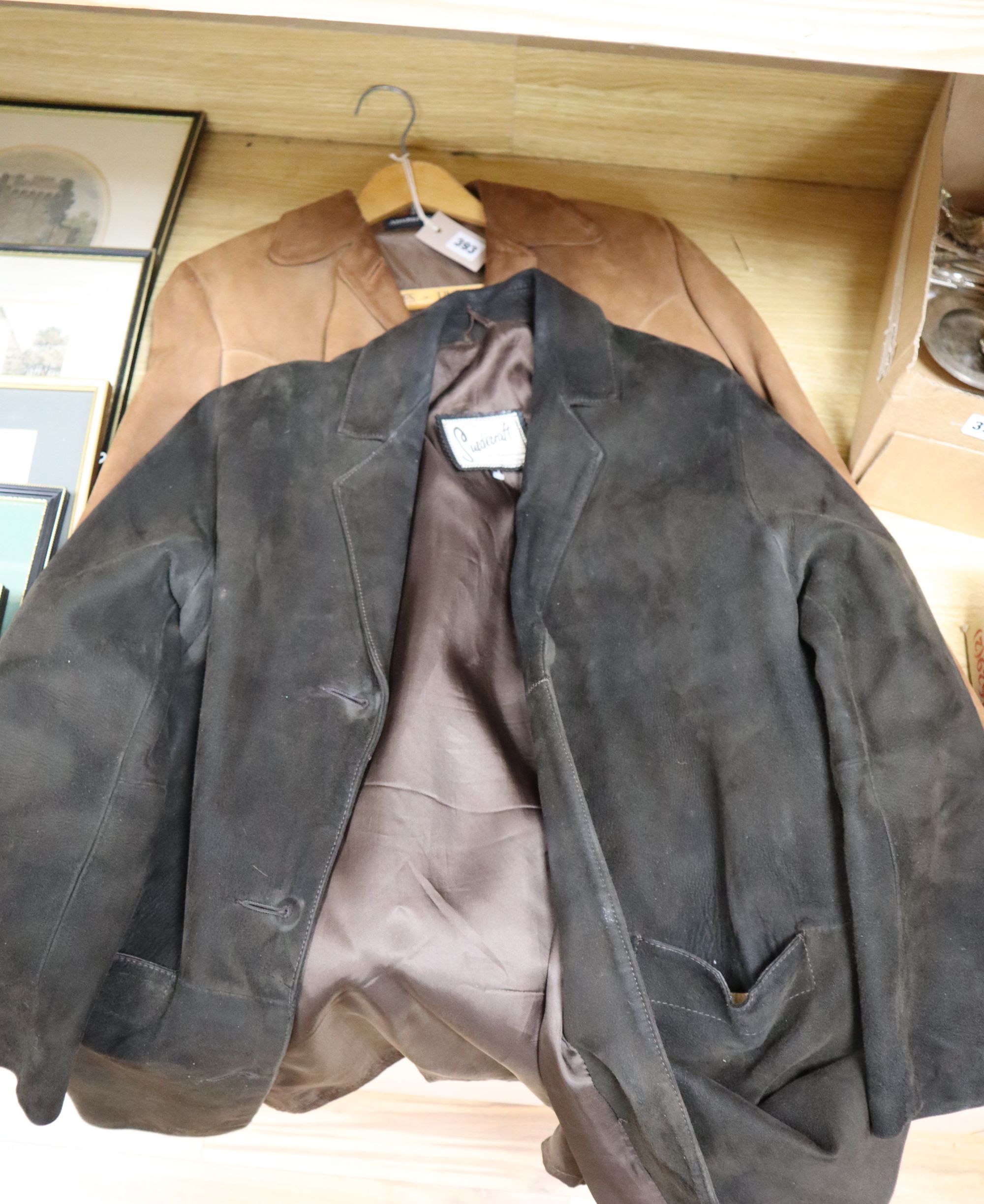 A light tan 1960s suede jacket and a similar chocolate brown jacket